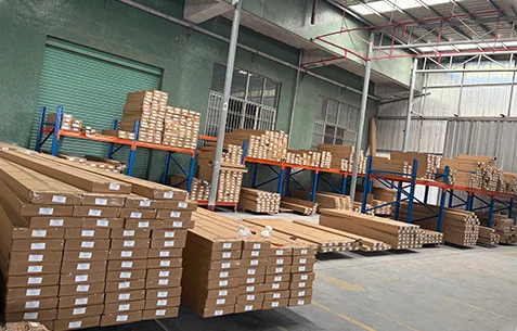 Finished track lighting rails stored in the warehouse.