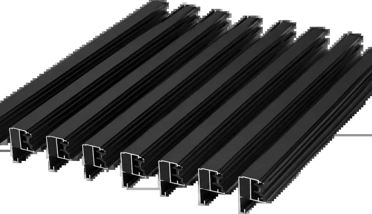 Black aluminium magnetic track rail profiles showing the internal low-voltage conductor channel