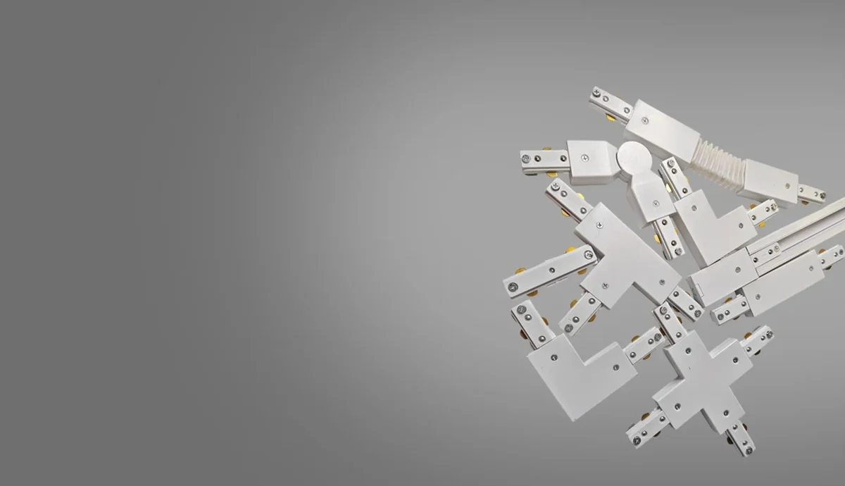 Straight, corner, T, cross and flexible track rail connectors used to plan runs and feed points
